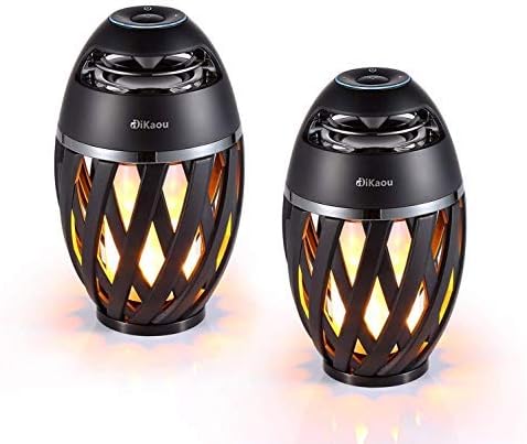 Bluetooth speaker glowing with a flickering flame effect on a summer patio table