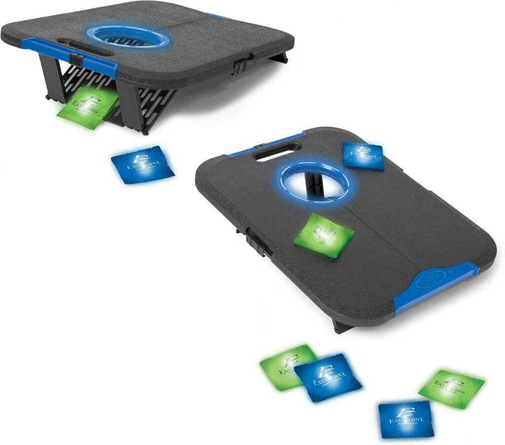 Cornhole game board lit with LED lights in a lawn game setup