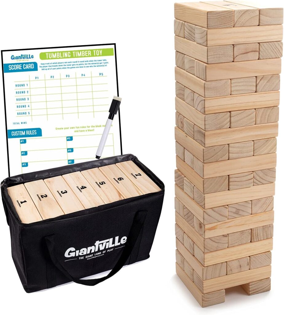 Giant wooden Jenga blocks stacked on the lawn for outdoor play