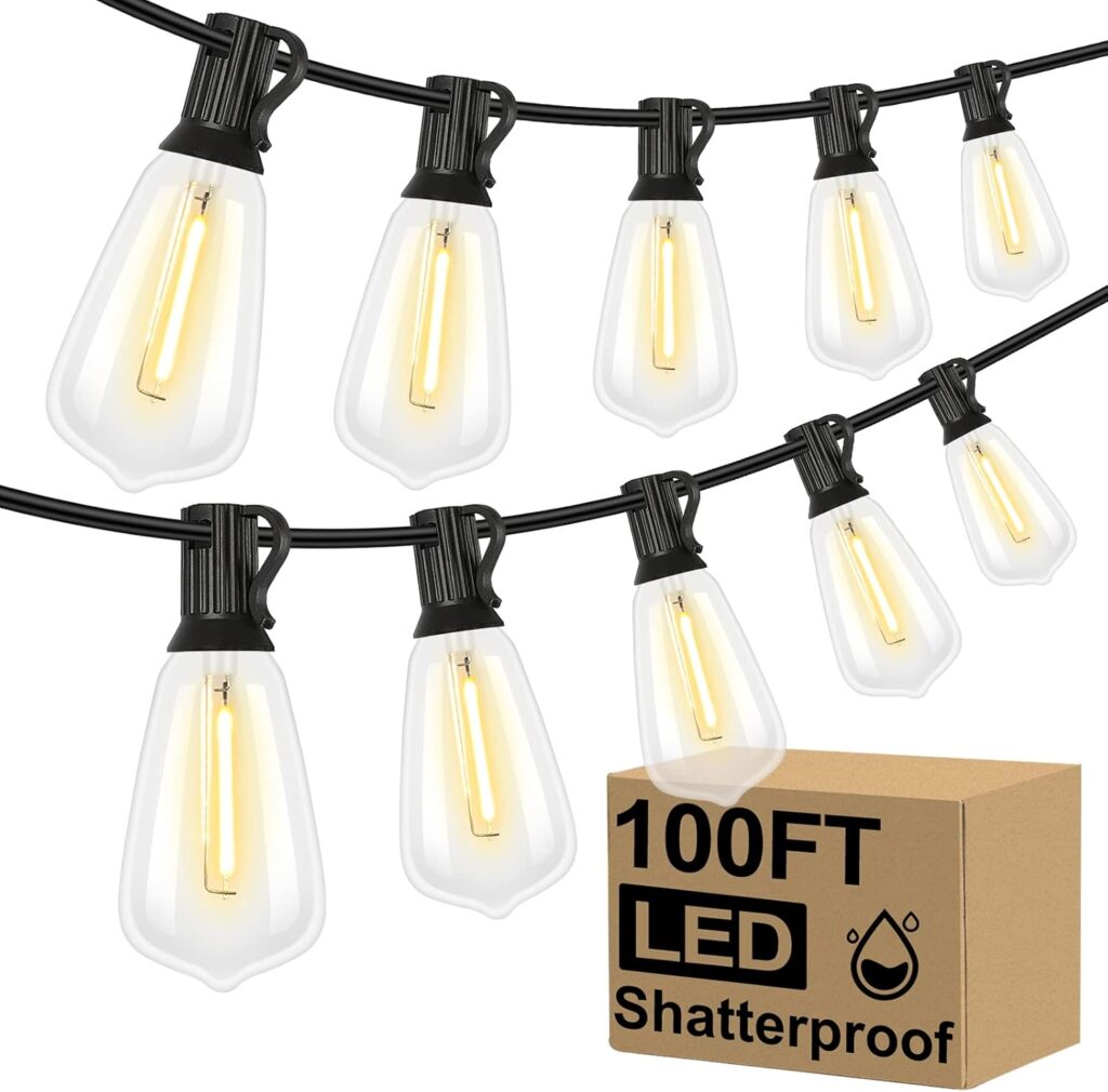 Shatterproof string lights draped across a backyard at sunset